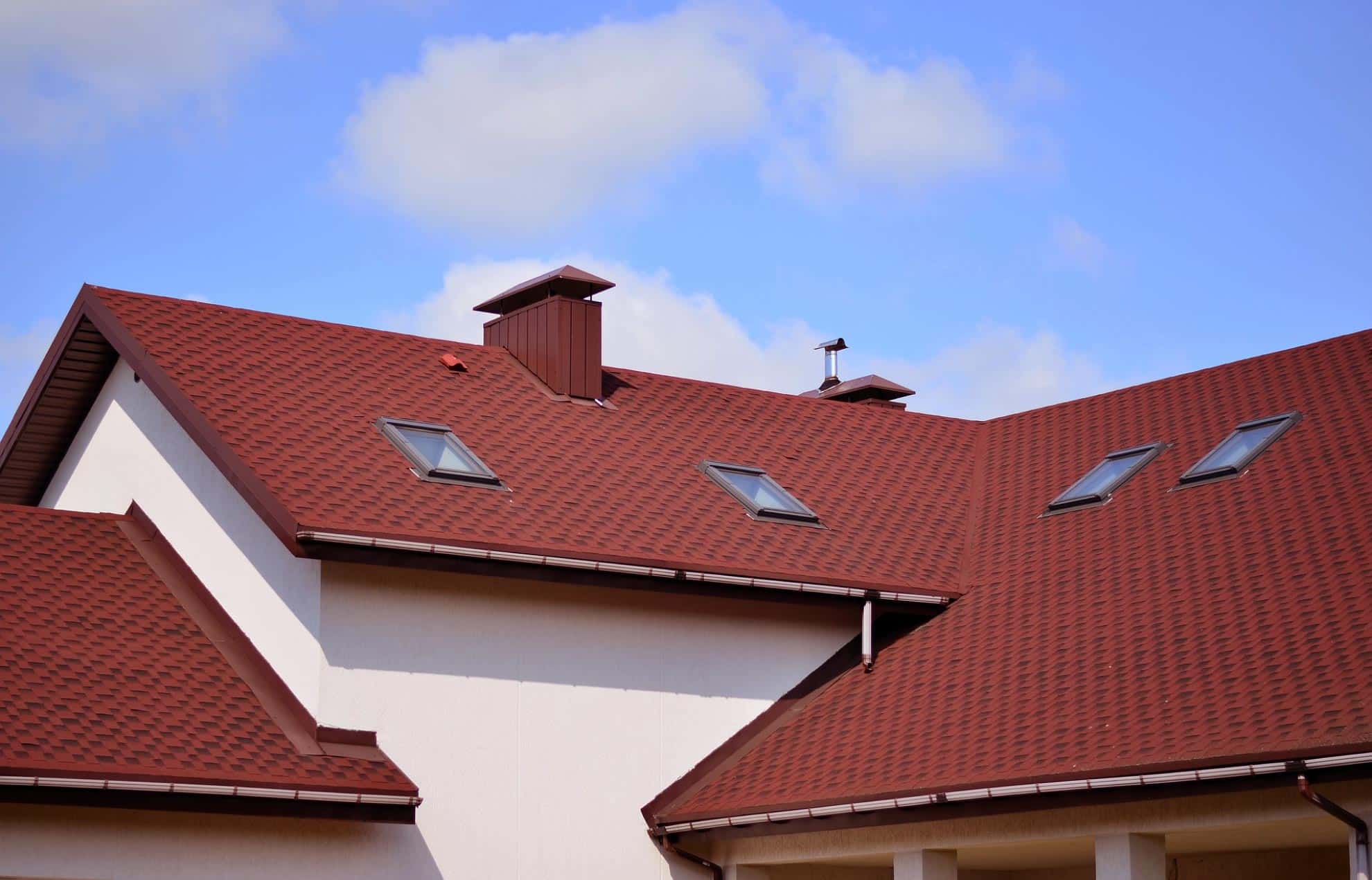 Background image showing a professional roofing service